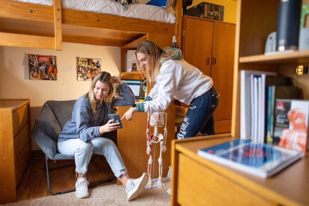Roommates work together in a suite style unit.